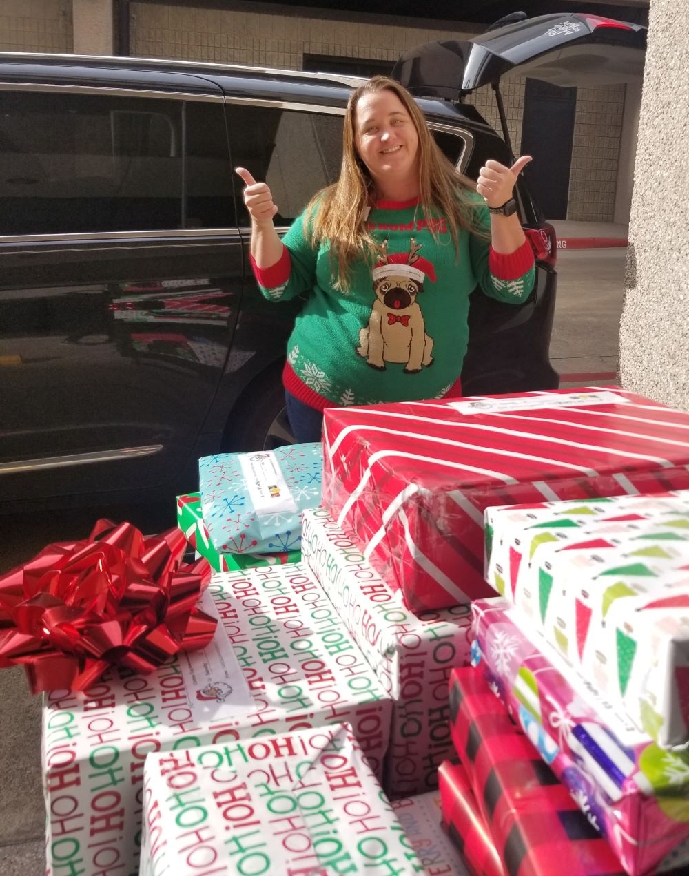 Kim Middleton delivering Santaccountant gifts