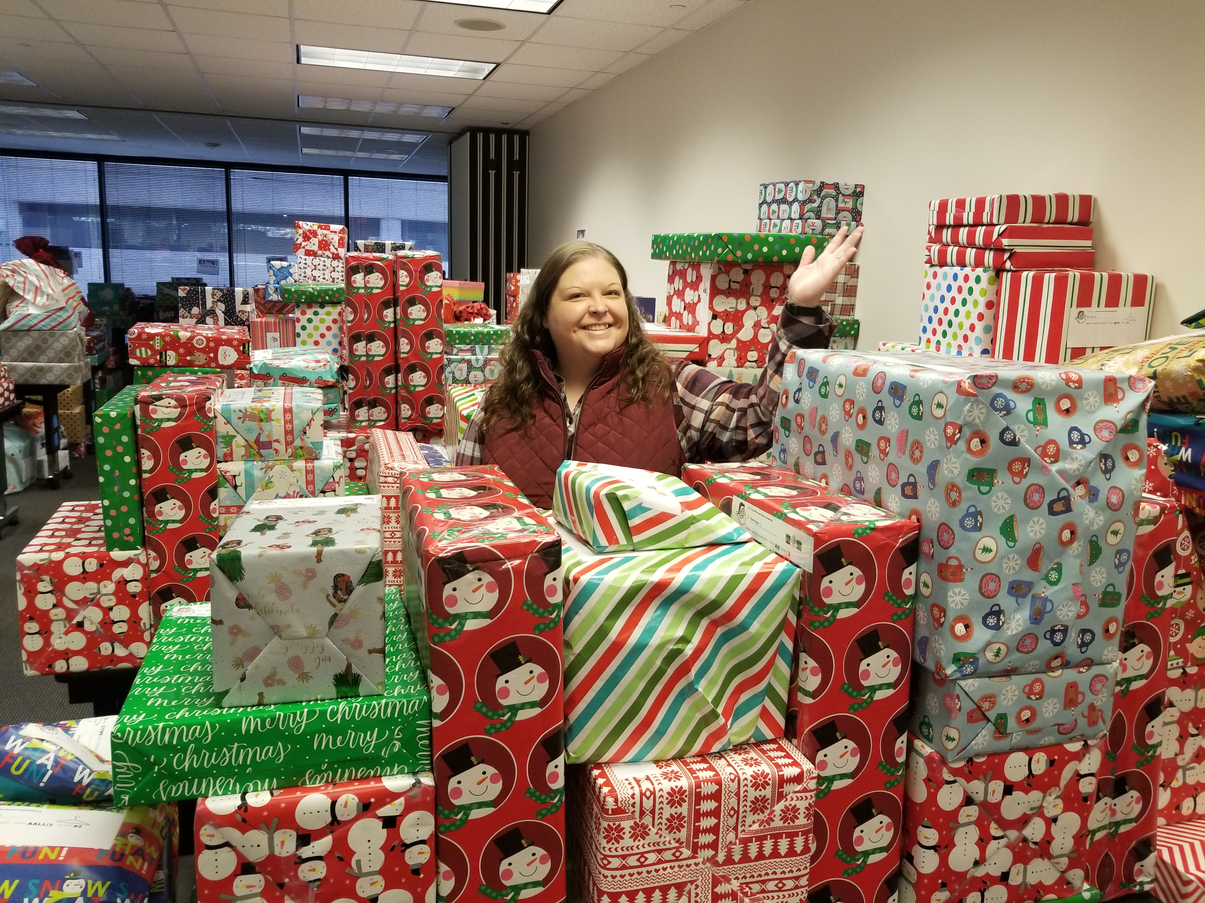 Stephanie Buduhan in a mountain of gifts Stephanie Buduhan in a mountain of gifts